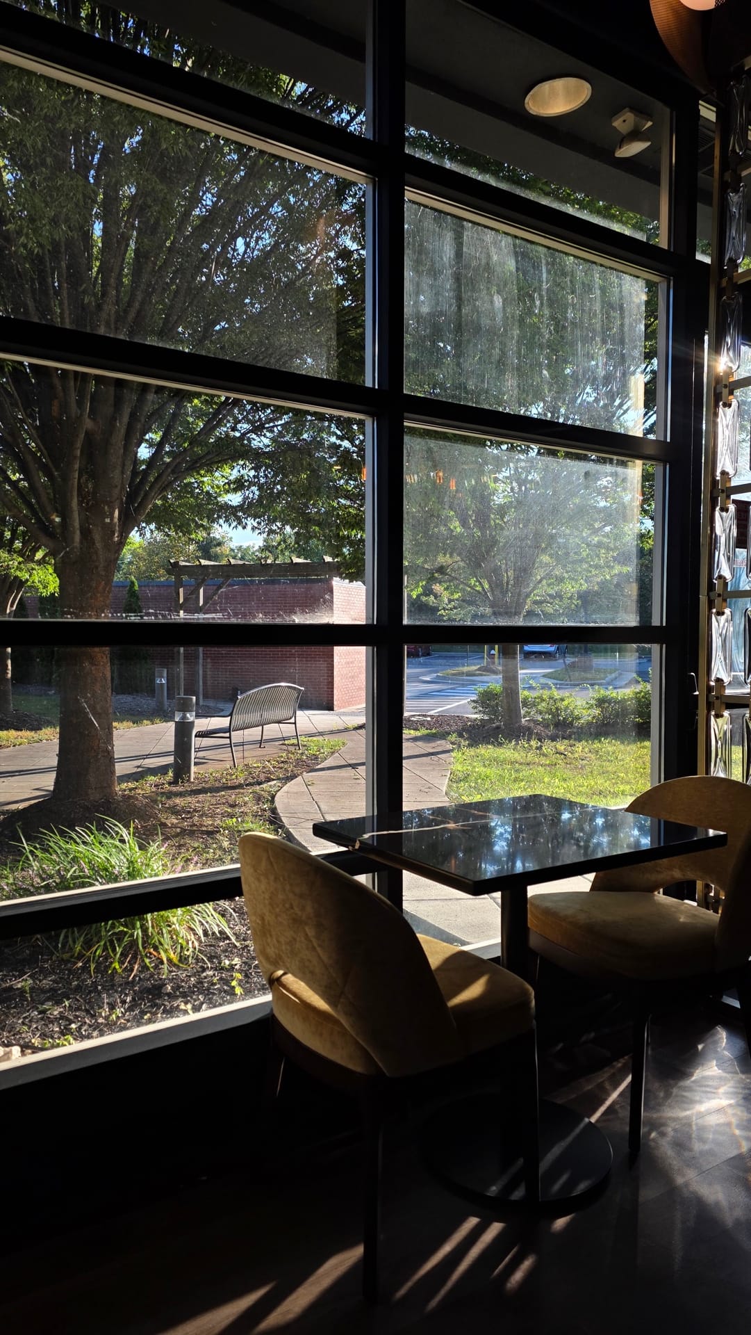 Floor-to-ceiling windows with garden view