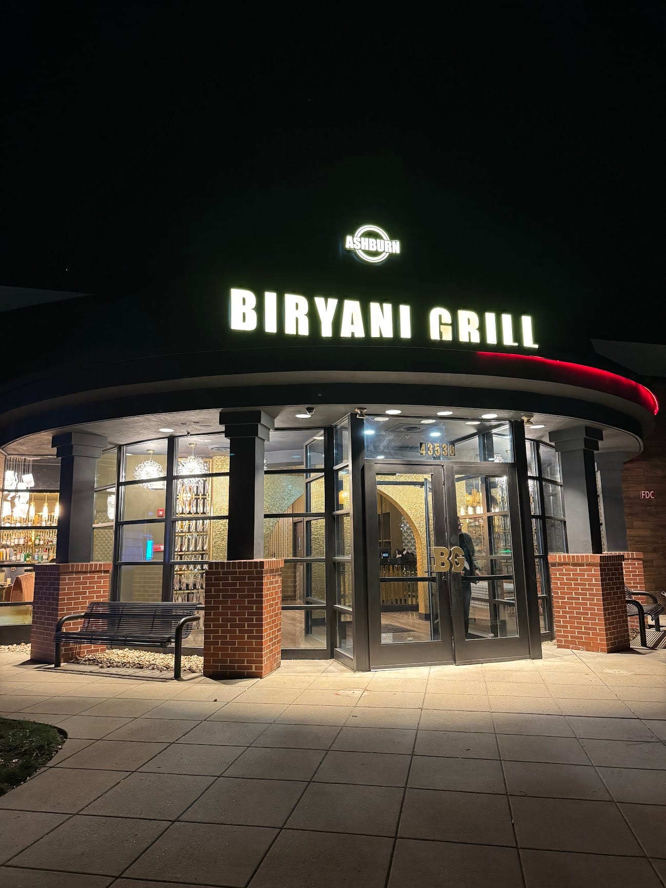 Ashburn Biryani Grill glowing exterior at night